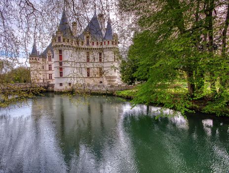 Azay le Rideau, France - April 17,2019: Chateau d'Azay-le-Rideau in Loire Valley, France. Castle of Azay-le-Rideau is one of the travel destinations in Europe. Scenic view of the French castle in spring.