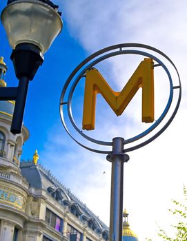 Paris, France - April 21, 2019 - A sign that marks the entrance to a metro station for the Paris underground subway system in France. 