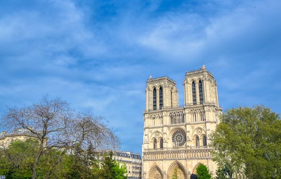 Paris, France - April 21, 2019 - Notre Dame Cathedral on the Seine River in Paris, France after the fire on April 15, 2019.