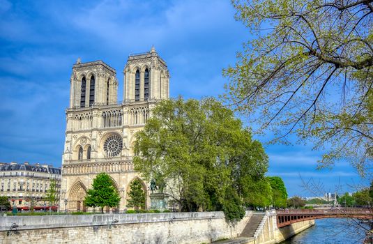 Paris, France - April 21, 2019 - Notre Dame Cathedral on the Seine River in Paris, France after the fire on April 15, 2019.