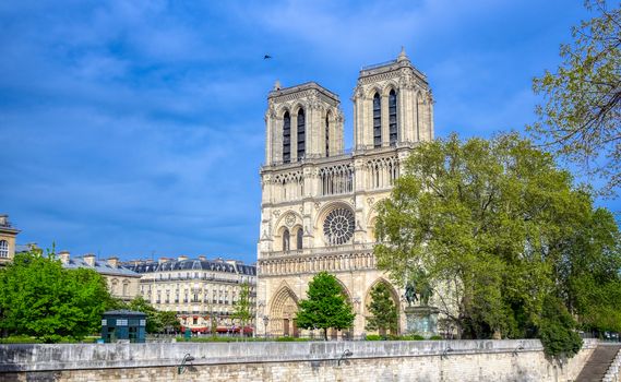 Paris, France - April 21, 2019 - Notre Dame Cathedral on the Seine River in Paris, France after the fire on April 15, 2019.