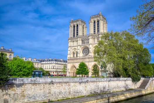 Paris, France - April 21, 2019 - Notre Dame Cathedral on the Seine River in Paris, France after the fire on April 15, 2019.