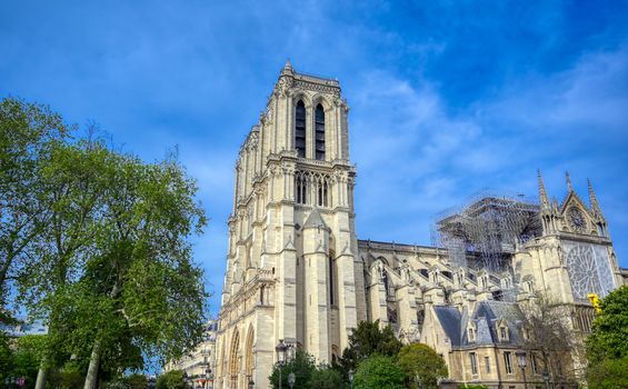 Paris, France - April 21, 2019 - Notre Dame Cathedral on the Seine River in Paris, France after the fire on April 15, 2019.