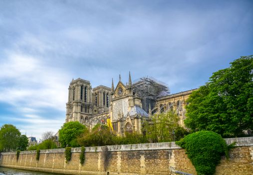 Paris, France - April 21, 2019 - Notre Dame Cathedral on the Seine River in Paris, France after the fire on April 15, 2019.