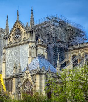 Paris, France - April 21, 2019 - Notre Dame Cathedral on the Seine River in Paris, France after the fire on April 15, 2019.