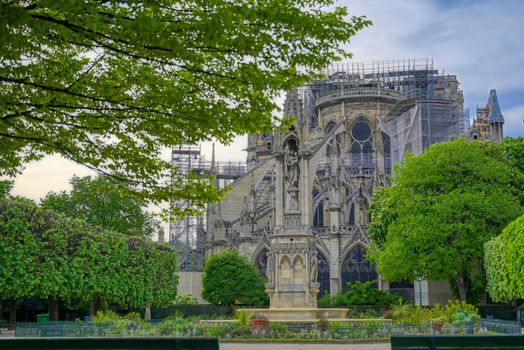 Paris, France - April 21, 2019 - Notre Dame Cathedral on the Seine River in Paris, France after the fire on April 15, 2019.