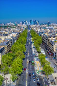 A view of Paris, France from the Arc de Triomphe on a sunny day.