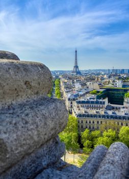 A view of the Eiffel Tower and Paris, France from the Arc de Triomphe.