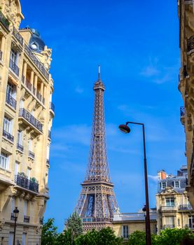 A view of the Eiffel Tower from the streets of Paris, France.