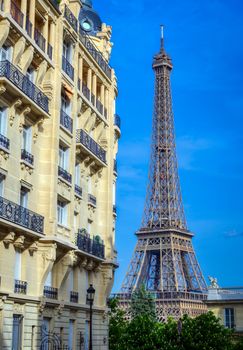 A view of the Eiffel Tower from the streets of Paris, France.