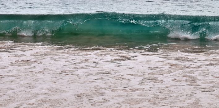 Stunning indian ocean waves at the beaches on the paradise island seychelles.