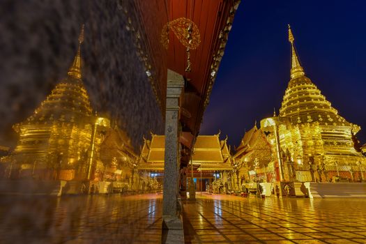 Reflection of Pagoda at Doi Suthep temple the most famous landmark of Chiang mai province, Thailand.