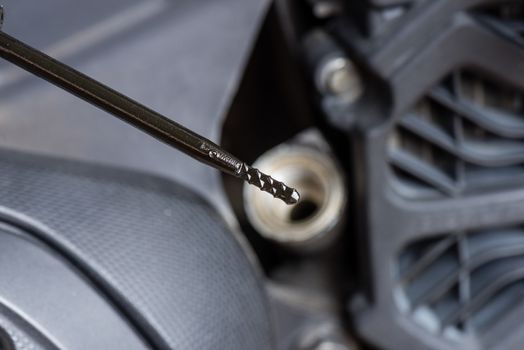engine oil level of motorcycle on dipstick. Motorcycle maintenance concept.