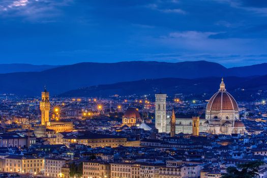 Duomo Santa Maria Del Fiore and tower of Palazzo Vecchio at dusk in Florence, Tuscany, Italy