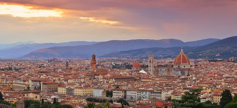 Panorama of Duomo Santa Maria Del Fiore and tower of Palazzo Vecchio at sunset in Florence, Tuscany, Italy