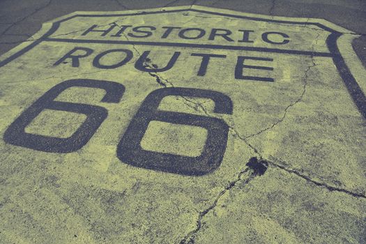 Sign of historic route 66 on the asphalt.