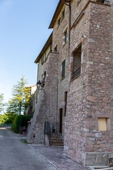 macerino,italy june 02 2020 :external walls of the village of macerino all made of stone