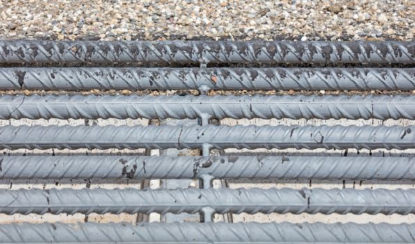 Cattle grid in ground, an obstacle used to prevent wild cattle and other wildlife from crossing