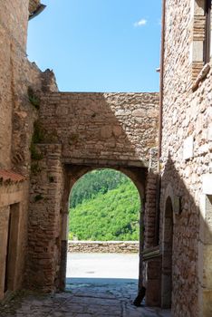 macerino,italy june 02 2020 :main gate of the village of macerino stone fairy