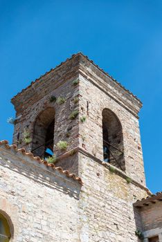 macerino,italy june 02 2020 :ancient church in the village of macerino located in the square and completely made of stone