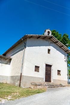 macerino,italy june 02 2020 :very small ancient church outside the village of macerino