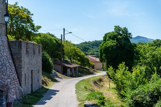 macerino,italy june 02 2020 :road that enters or leaves the village of Macerino in this case exiting