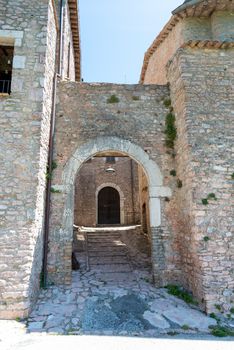 macerino,italy june 02 2020 :main gate of the village of macerino stone fairy