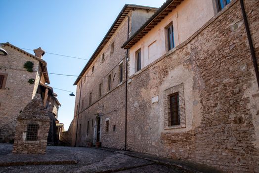 macerino,italy june 02 2020 :lower town square and largest palace in the village