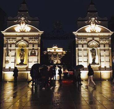 Exterior facade of classic building in the European city at night, architecture and design detail