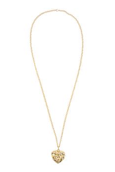 Heart shaped gold necklace isolated on white background with clipping path