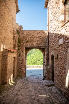 macerino,italy june 02 2020 :main gate of the village of macerino stone fairy