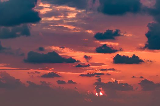 Clouds on the red sky during sunset