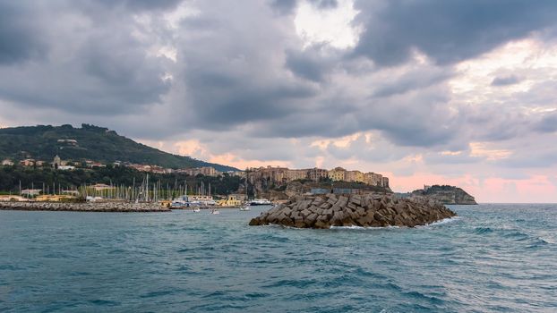 Evening view of port entrance in Tropea town, Calabria, Italy