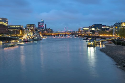 View of River Thames in London at dusk on a cloudy day, United Kingdom