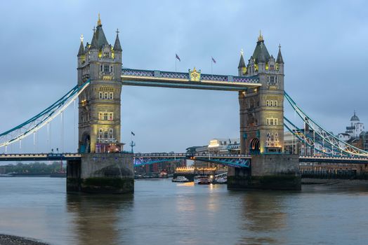 View of thr Tower Bridge in London at dusk on a cloudy day