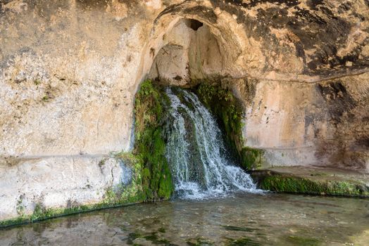 Fountain of the Nympheum in upper terrace of Greek Theatre in Syracuse, Sicilly, Italy