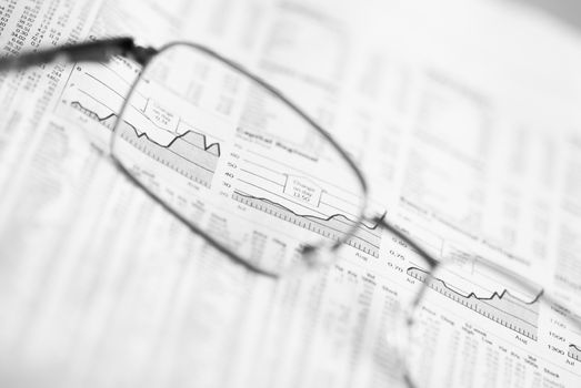 Glasses Over Financial Chart