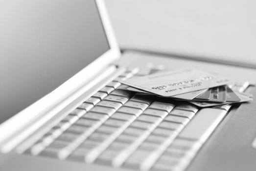 Credit cards on a laptop keyboard