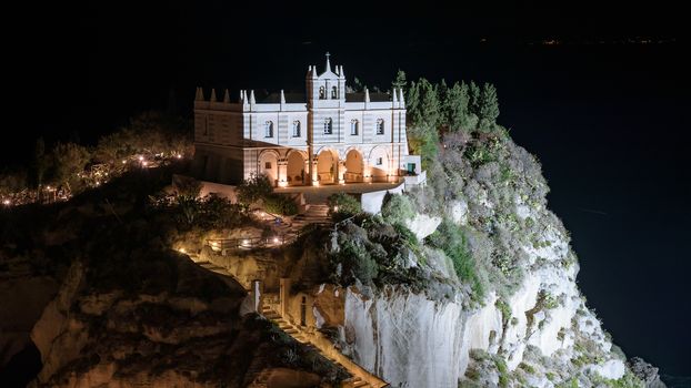 Sanctuary of Santa Maria Island in Tropea by night, Calabria, Italy