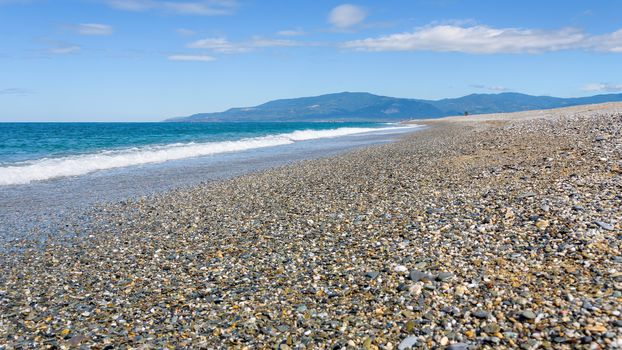 View of a gravel beach at the Tyrrhenian Sea in Calabria, Italy