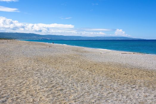 View of a gravel beach at the Tyrrhenian Sea in Calabria, Italy