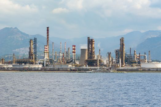 Industrial zone in Milazzo town on Sicily seen from the sea, Italy