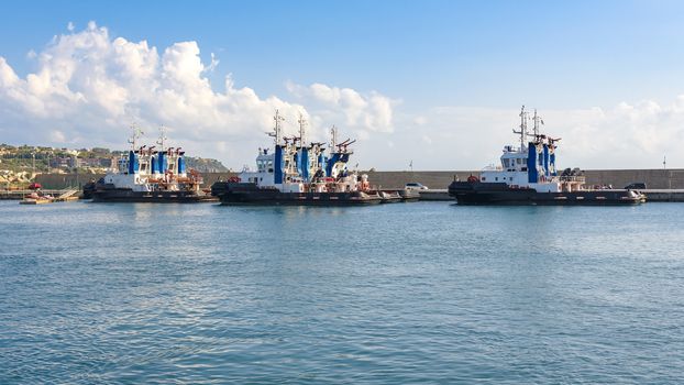 Tugs in the port of Milazzo, Sicily, Italy