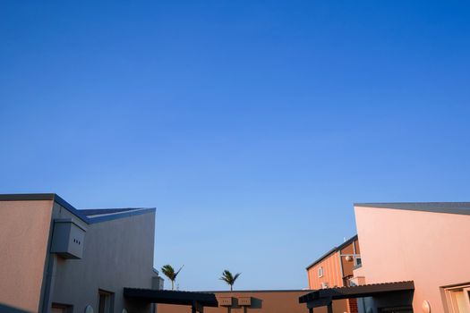 Modern and minimal residential building with light and shadow, summer background