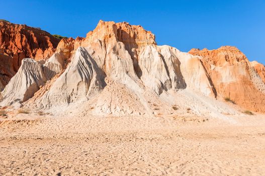 Red cliffs at Falesia Beach in Algarve region, Portugal