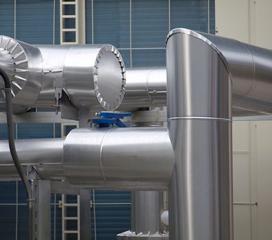 Large stainless steel pipes of an industrial air cooling system
