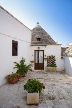 Famous trulli houses in Alerbobello town, Apulia, Italy