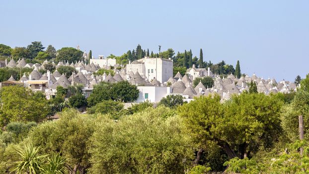 Panoramic view of the roofs of famous Alberobello's trulli, Apulia, Italy