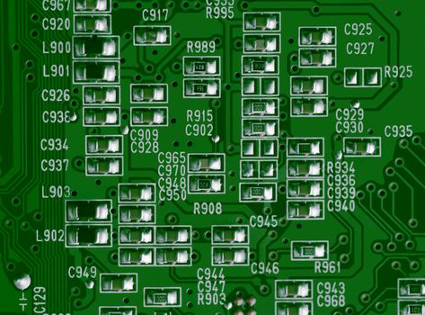 Close up of a printed green computer circuit board