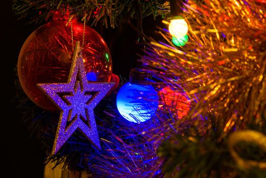 Closeup of decorated christamas tree as background